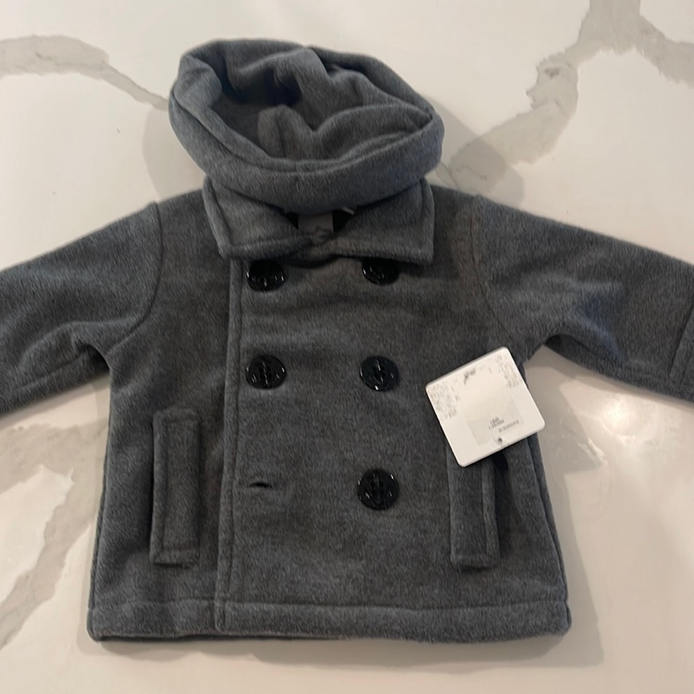 Starting out nine month please coat for boys & girls with the cap. And with 🏷️